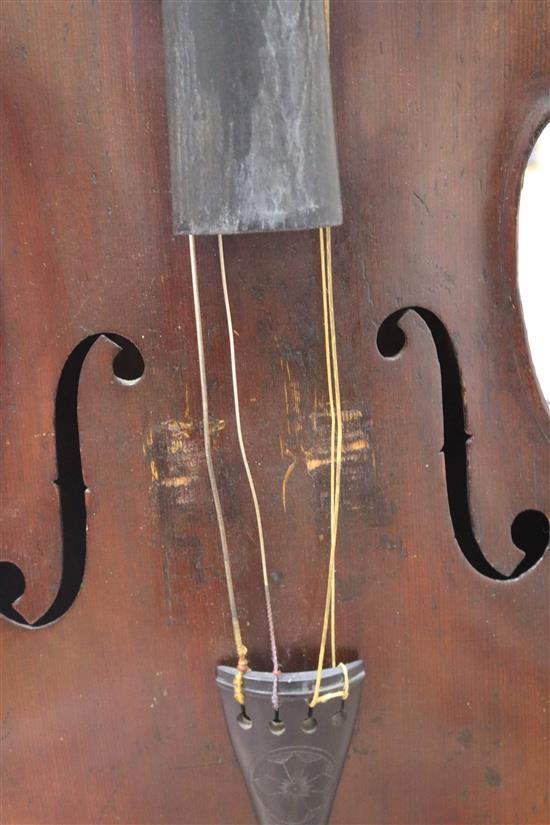 A full sized cello bearing label Arthur Richardson ... and two bows (one silver mounted), the other signed Wilhelm ... uhl